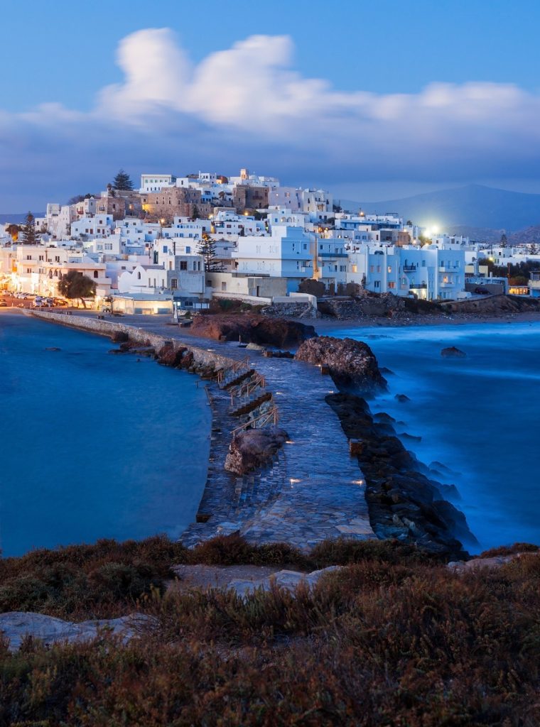 The Naxos island aerial panoramic view on sunset. Naxos is the largest of the Cyclades island group in the Aegean, Greece